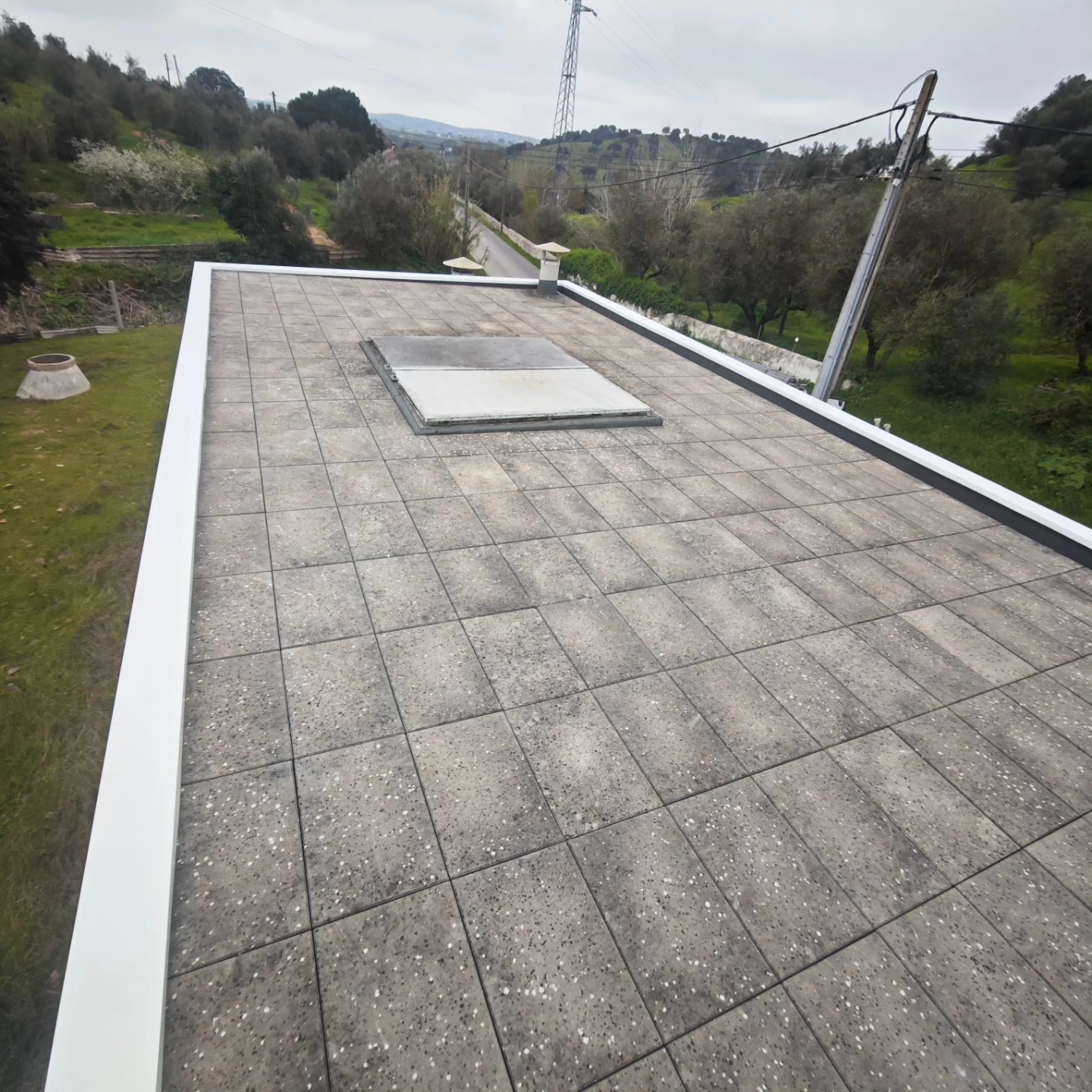 Capeamento em terraço com vista panorâmica